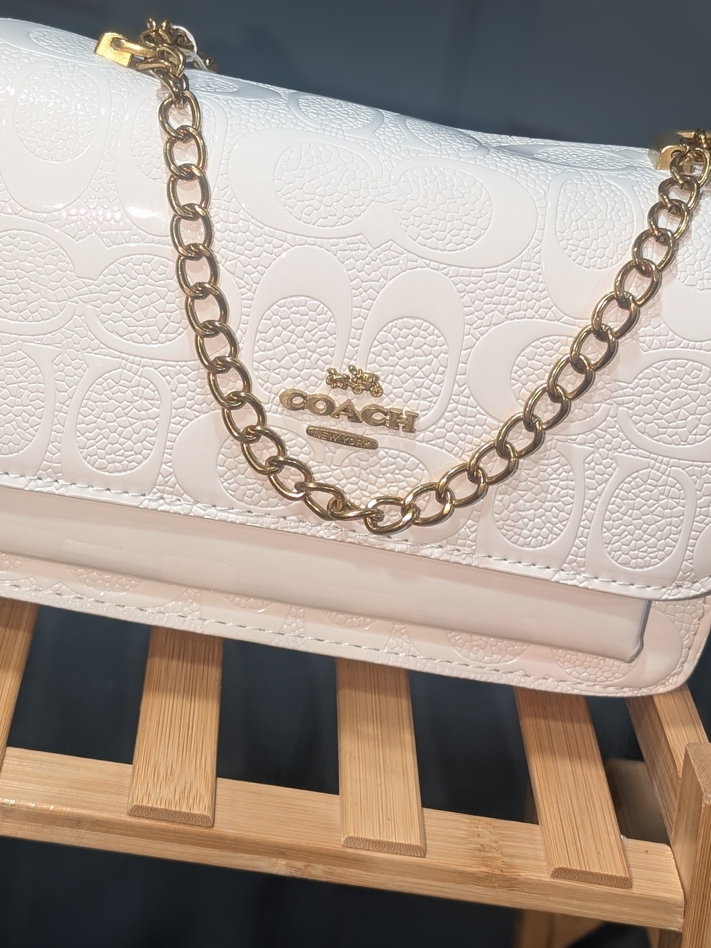 Fashion Inspired White Embossed Signature Shoulder Bag with Gold Chain